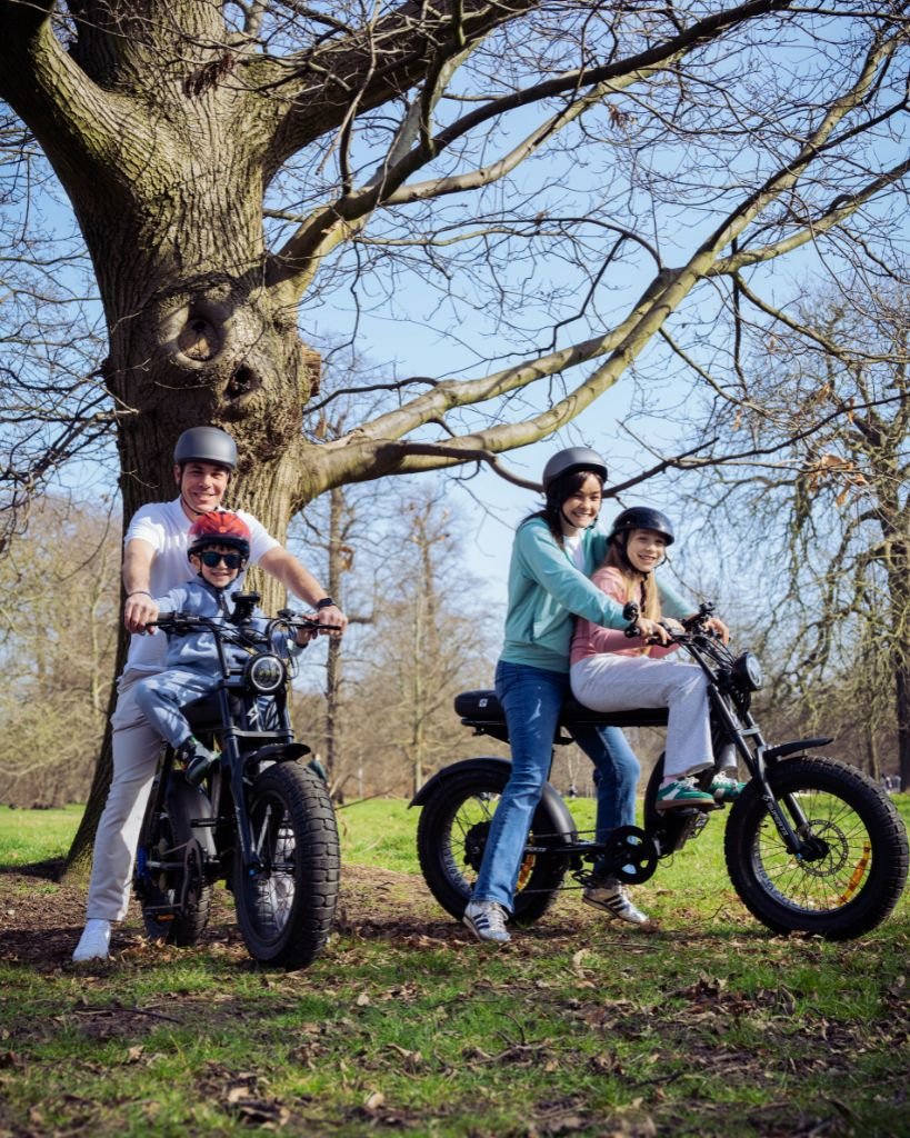 Family enjoying a guided London e-bike tour on premium Super73 electric bikes in Hyde Park with FOF Bike Tours.