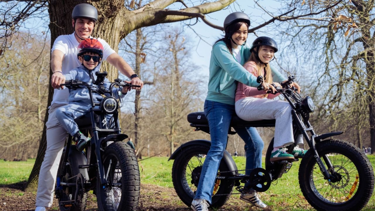 Family enjoying a guided London e-bike tour on premium Super73 electric bikes with FOF Bike Tours, exploring London's parks and historic landmarks together.